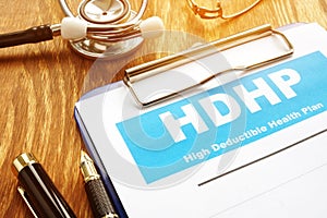 High Deductible Health Plan HDHP with clipboard