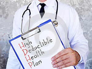 High-Deductible Health Plan HDHP is shown on the conceptual business photo