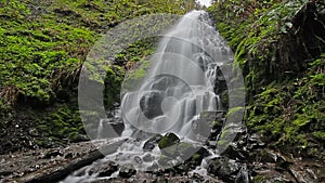 High definition movie of long exposure smooth water flowing of Fairy Falls in Oregon