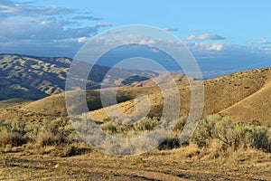 High Desert Hills Stratus Clouds Breathtaking Idaho Landscape photo