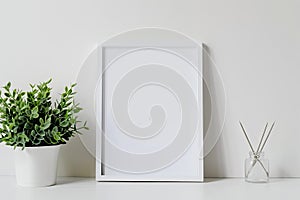 Minimalist Mockup Photo Frame with Plant and Diffuser
