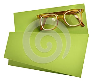 High diopter retro eyeglasses with yellow frame on green creative support