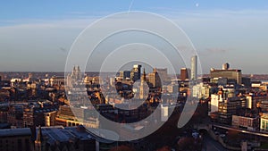 A high drone shot of Liverpool City centre at sunrise with the entrance to Queensway tunnel.