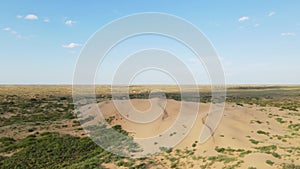 high dune in Astrakhan in Russia is a big brother in summer. top view from a drone.