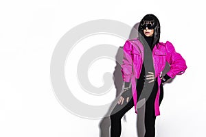 High fashion look. Glamour stylish beautiful girl model in colorful clothing isolated on white background. Beauty stylish brunette