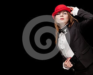 High fashion look. portrait of beautiful sexy young female woman with red lips on black background with hat