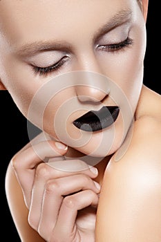 High fashion model. Make-up trend, rock black lips