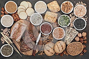 High fibre health food with whole grain bread and rolls, whole wheat pasta, grains, nuts, seeds, oatmeal, oats, crackers, barley