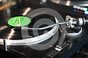 High fidelity turntable playing a vinyl record