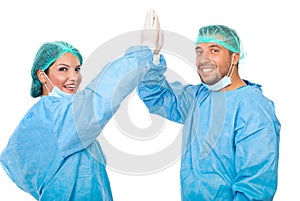 High five happy surgeons team