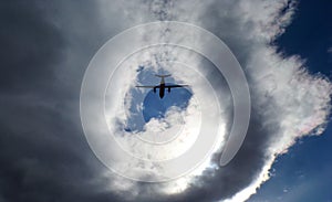 High flying plane against the blue sky. photo