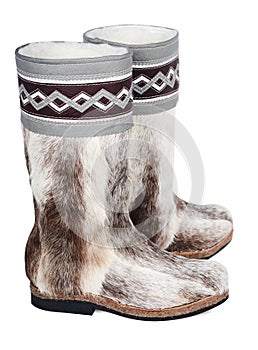 High fur boots on a white background