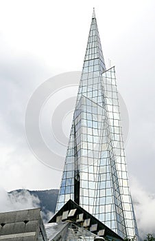 High glass spire building in Andorra