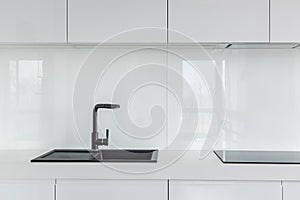 High gloss white kitchen cabinets