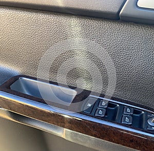 Rich Leather and Burlwood Woodgrain in a Luxury Vehicle photo