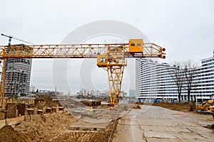 High heavy yellow metal iron load-bearing construction stationary industrial powerful gantry crane of bridge type on supports