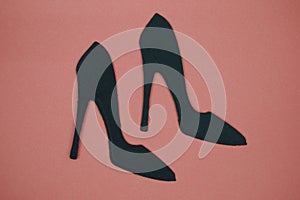 High heel paper cut out with pink background