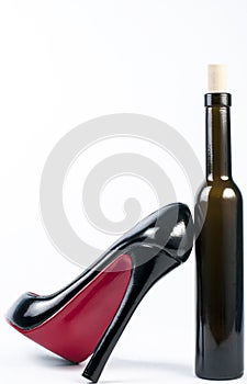 High heel shoe with bottle