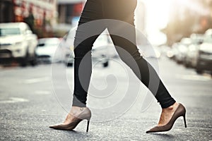 High heels, business and woman crossing the street closeup in a city on her commute to work. Feet, fashion and a female