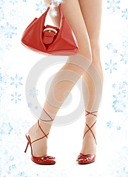 High heels and red purse with snowflakes