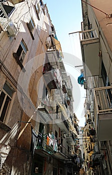 high houses on the narrow street in Naples City in Italy in the