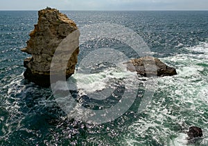 High impregnable rock in the water near the village of Tyulenovo in Bulgaria, Black Sea