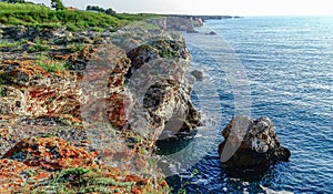 High inaccessible coastal cliffs made of shell rock near the village of Tyulenovo, southern Bulgaria