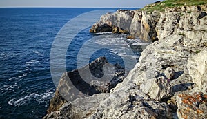 High inaccessible coastal cliffs made of shell rock near the village of Tyulenovo, southern Bulgaria