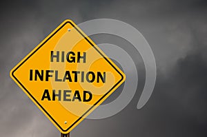 High inflation ahead conceptual traffic sign with stormy sky in background photo