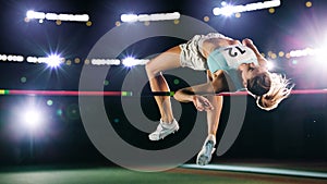 High Jump Championship: Professional Female Athlete on World Championship Successfully Jumping over