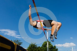 High jump in a worm eye's view photo