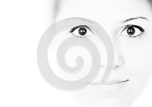 High key black and white portrait of a girl wearing eyeliner