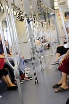 High key blurred image of Passengers in the train