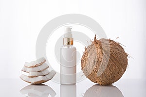 High key homemade cosmetic coconut products with coconut on whit