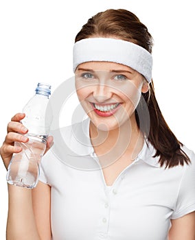 High key Portrait of attractive young woman drinking water isolated on white background