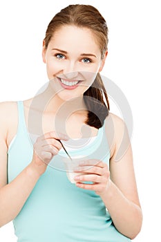 High key Portrait young caucasian woman eating yogurt isolated