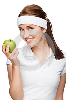 High key Portrait young woman holding green apple isolated on white background