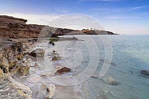 high key view of the pictureque cove at Cala Comte on Ibiza Island