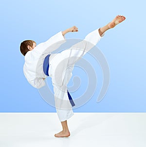 High kick leg the boy is beating in karategi