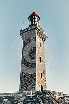 High lighthouse on a rock located on a French island.