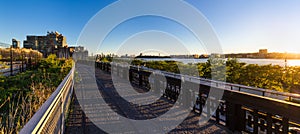 The High Line promenade at sunset with the Hudson River. Chelsea, Manhattan, New York City