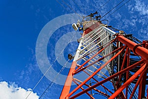 High mast metal structure telecommunication on tower with blue s