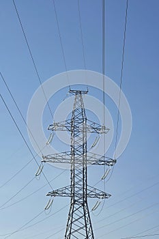 High metal tower. Power line with conductors, withstand surges due to switching lightning photo
