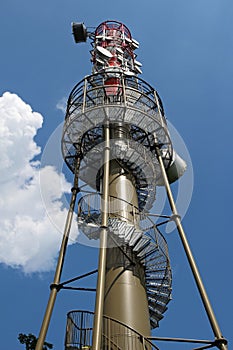 High metal TV tower with satellite