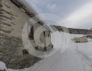 High mountain hut in winter, Valtellina, Italy