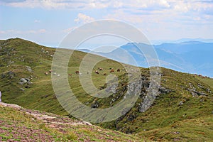 High mountain peak with its mountain range photo