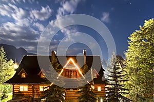 High mountain in Poland. National Park - Tatras. Old country house against sky