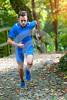 High-mountain running racer during an uphill workout