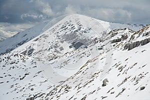 High mountain with snow near Rocca di Mezzo in Abruzzo photo