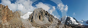 High mountain wall of Tian Shan peaks in Ala Archa panorama landscape